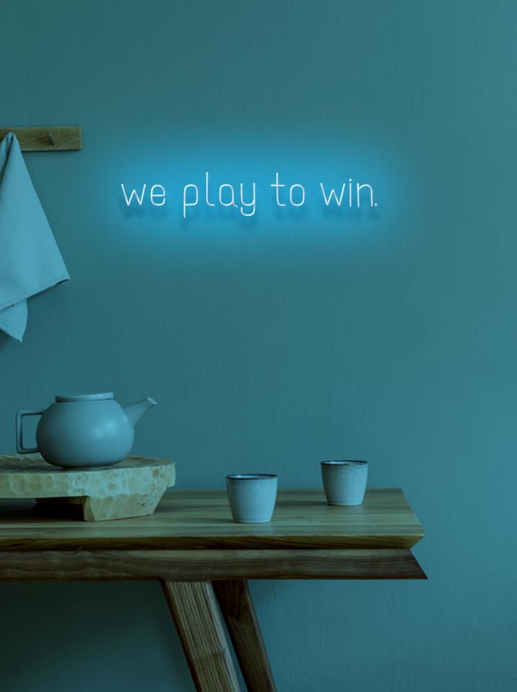 WE PLAY TO WIN - NeonFerry